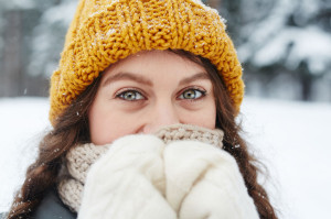Beautiful eyes of pretty girl in knitted hat boost immunity